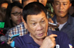 President Duterte declares state of lawlessness as Philippines blast kills 14